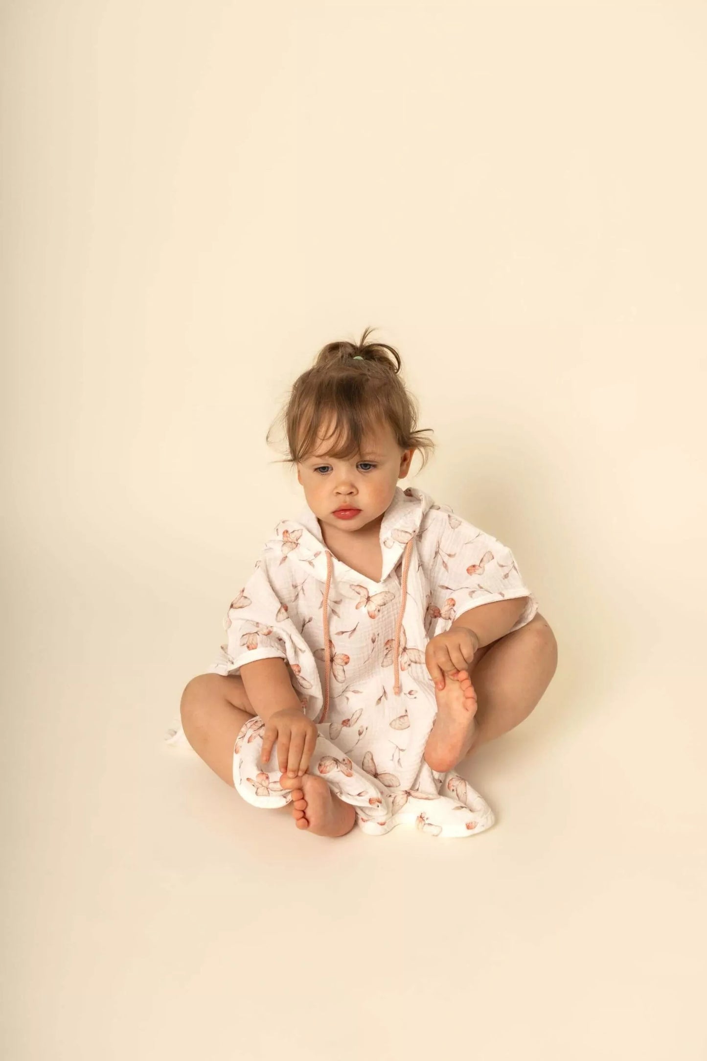 Poncho in mussola con cappuccio - farfalle