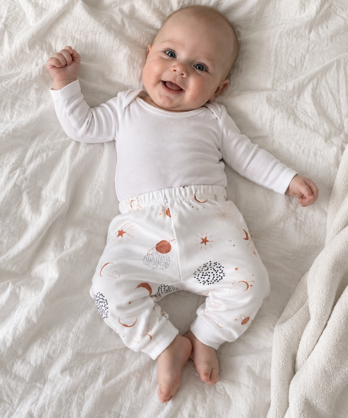 Neonato con pantalone Sky Stars in 100% cotone organico
