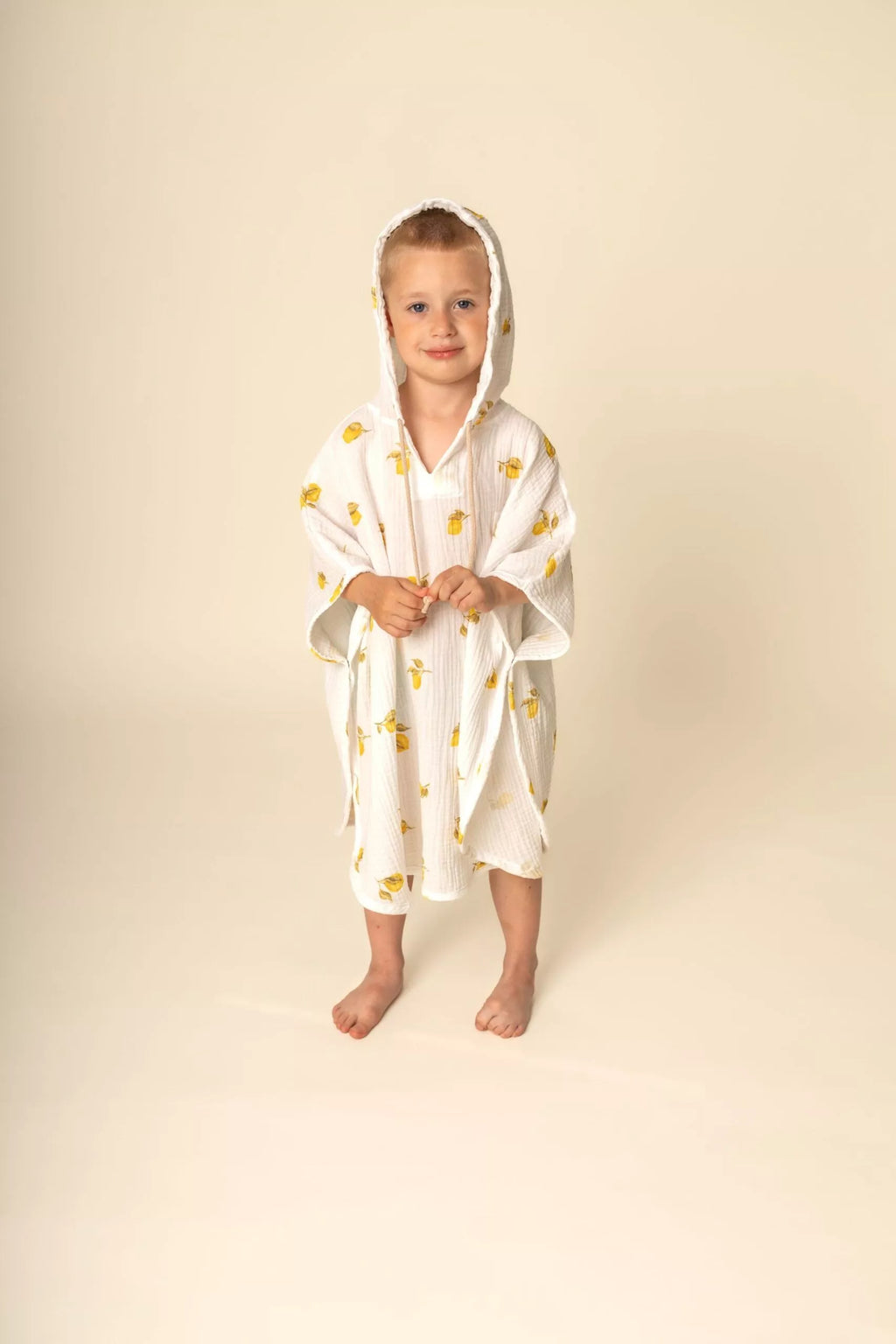 Poncho in mussola con cappuccio -limoni